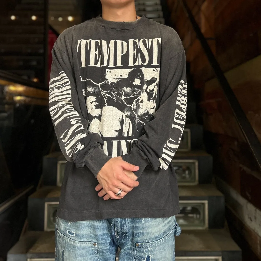 SAINT Mxxxxxx LS TEE/TEMPEST/BLK 'TEMPEST SAINT' Storm Religious Saints Cracked Retro Vulcanized Heavy Wash Long Sleeves Washed Black S-XL Assute Dyeing Multi-bit Horse Fading Craftsmanship Grinding and Hanging Holes Full of Old Feeling Top Printing Craftsmanship Purchasing Level